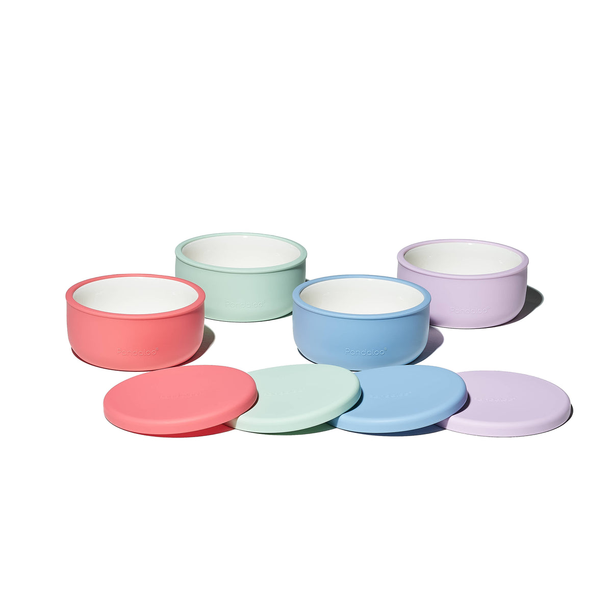 Four Pandaloo Kids porcelain bowls in Bubblegum Pink, Sweet Sage, Baby Blue and Lilac Rhapsody with silicone lids