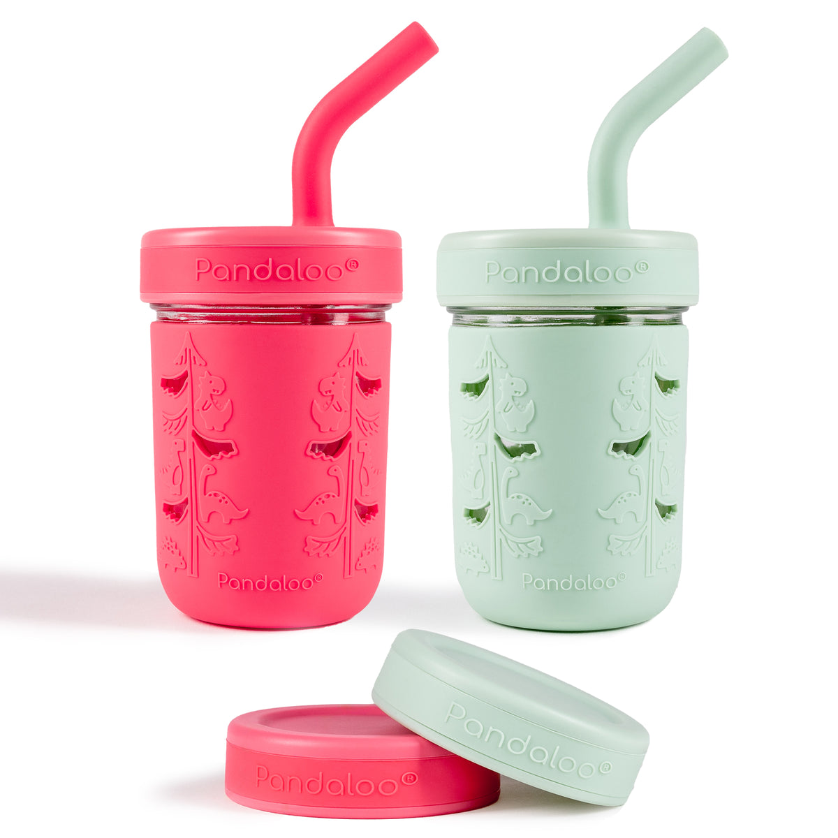Two Pandaloo Kids 8 oz glass mason jar cups in Bubblegum Pink and Sweet Sage with silicone sleeves, straw lids and storage lids