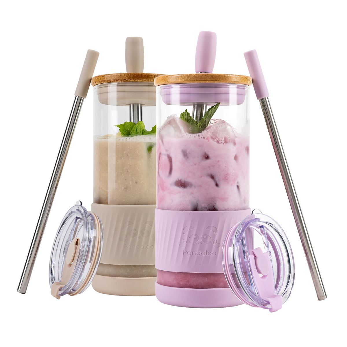 Two Pandaloo Original 20 oz glass tumblers in Lilac and Creamy Mushroom with bamboo lids, travel lids and stainless steel straws