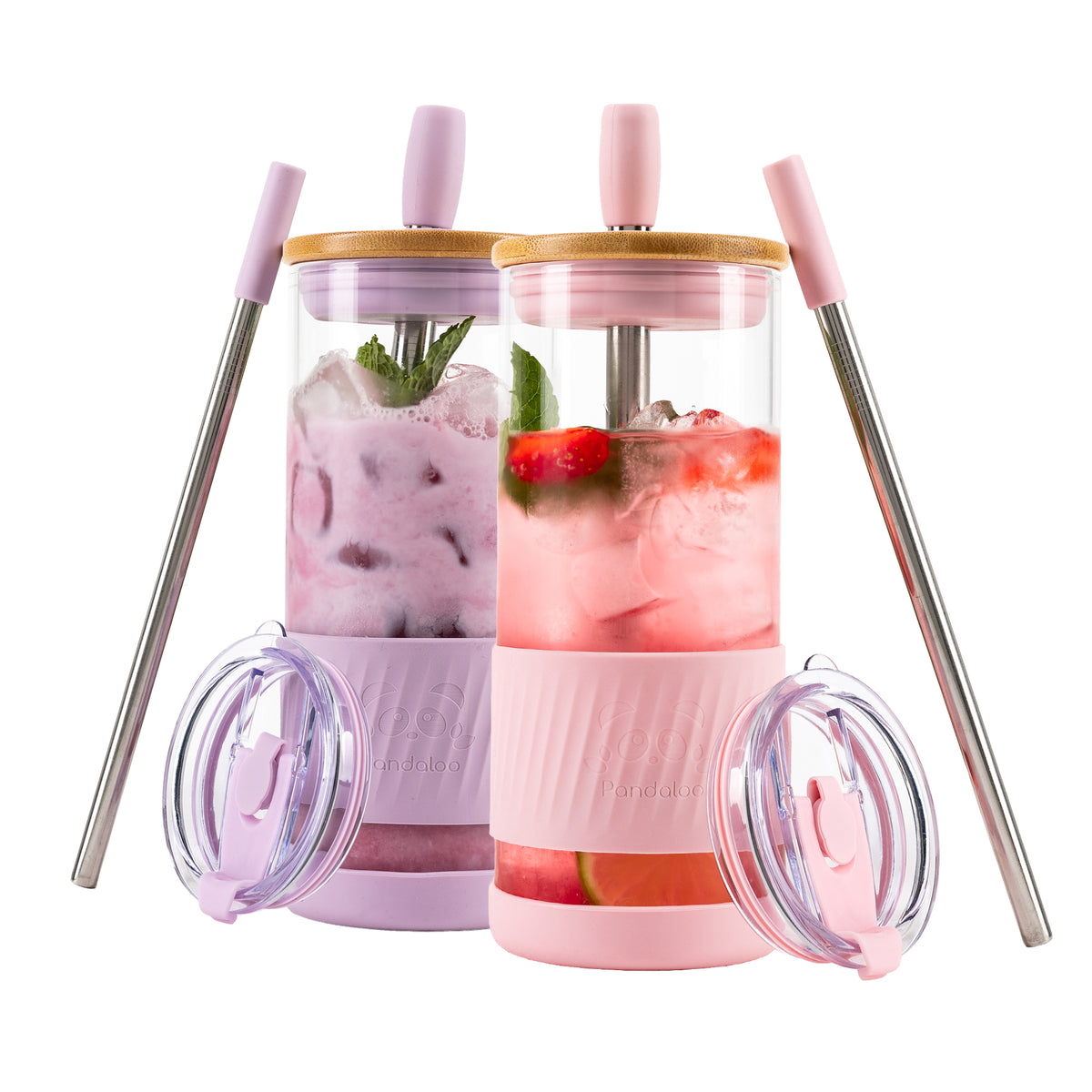 Two Pandaloo Original 20 oz glass tumblers in Lilac Rhapsody and Tender Pink with bamboo lids, travel lids and stainless steel straws