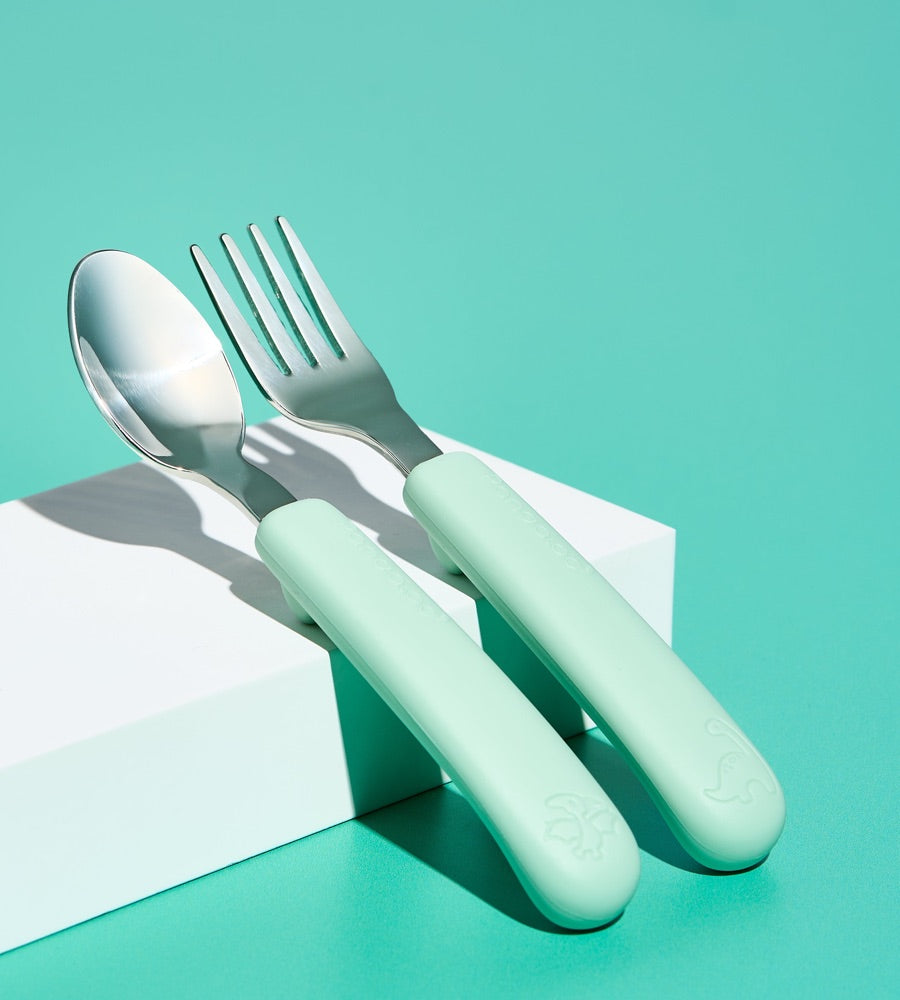 Pandaloo Kids stainless steel spoon and fork with soft mint silicone handles and rounded tips
